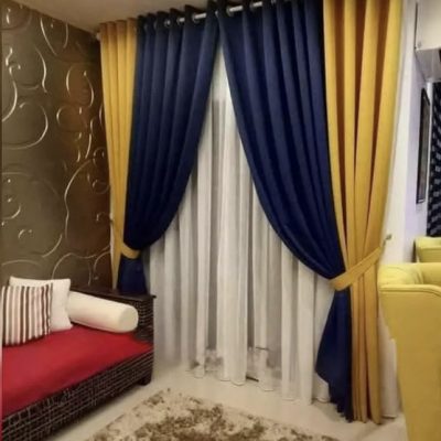 SET  DRAPERIE  CATIFEA  CULOARE  ALBASTRU  ÎNCHIS CU AURIU, PERDEA TRIPLUVOAL ALB.   
Cod. Produs: 310879